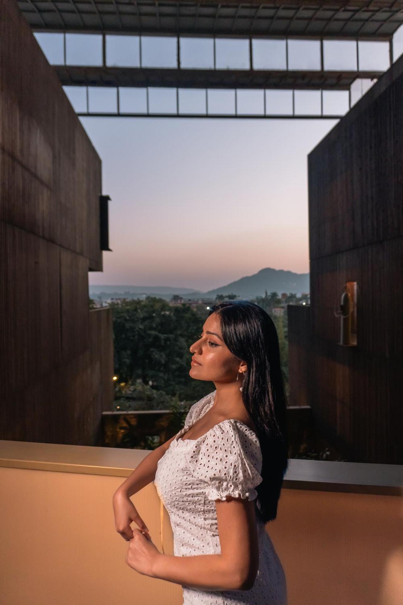 Radisson Resort And Spa Lonavla Exterior foto A woman in contemplation